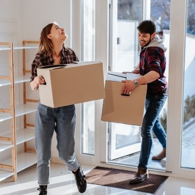 Couple moving into their new home.